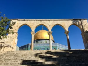 Southern Arches: 8th-century southern arches framing the Golden Dome of the Rock atop steep stairs