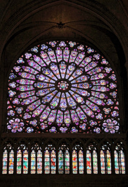 The north rose window, stained glass installed ca. 1250. Notre-Dame de Paris